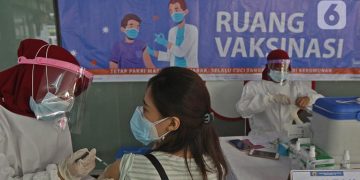 Pedagang Divaksin, Ekonomi Indonesia Diharapkan Membaik