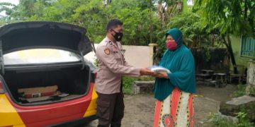 Melalui Baksos Polsek Gantarang Salurkan Bantuan Sembako Kepada Warga Kurang Mampu
