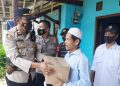Polisi Salurkan Bansos Kepada Korban Kebakaran Rumah Dimasa PPKM