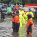 Banjir di Sejumlah Titik di Jakarta, Polantas Berjibaku Atur Lalin