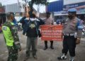 Operasi Yustisi hunting Gabungan Penegakan Disiplin Protokol Kesehatan Dalam Rangka Partisipatoris Dan Perpanjangan PPKM Berbasis Mikro Di Jln depan Pasar Paron .